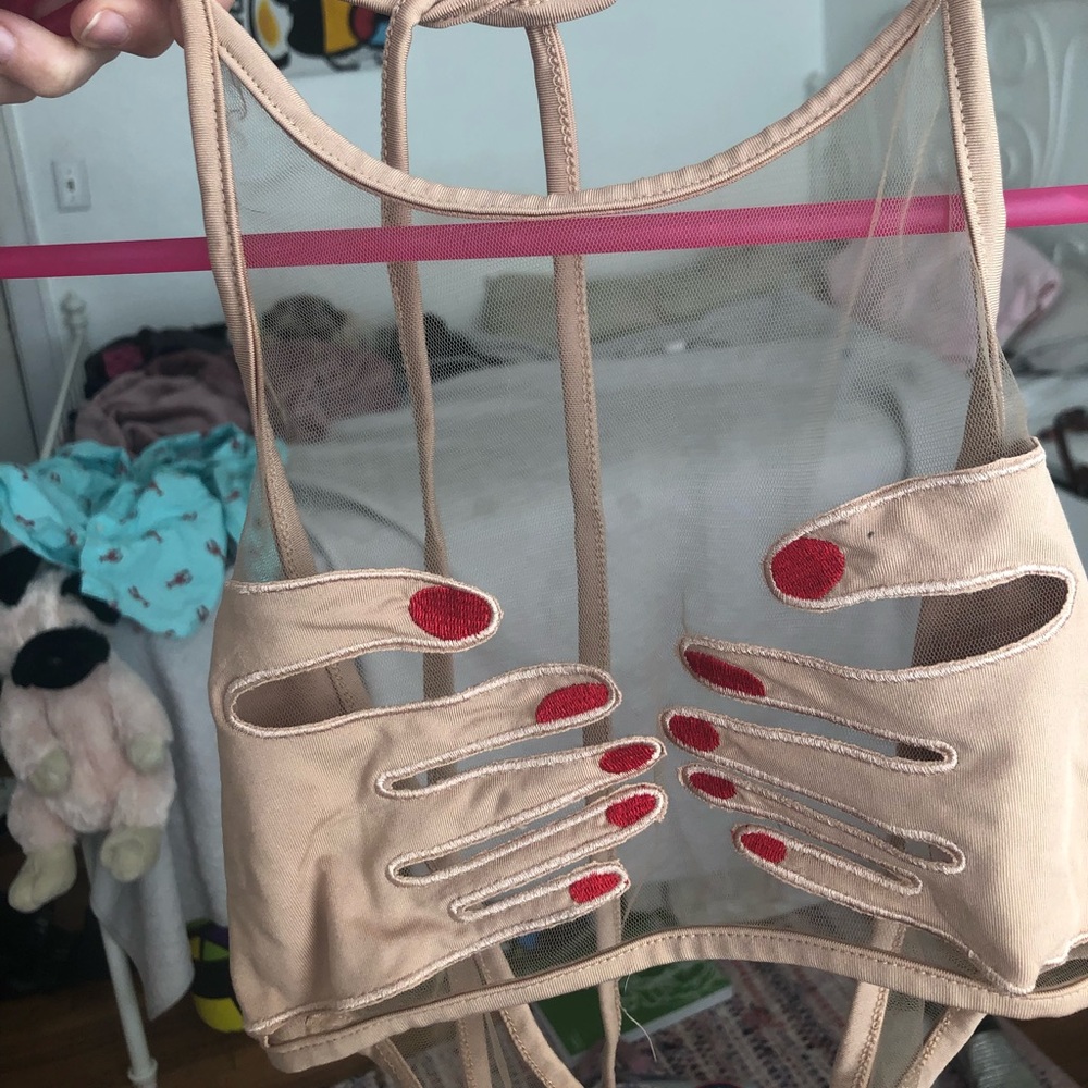 Funny female hands over boobs sheer festival top